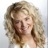 Portrait of an Underexposed community photographer with curly blonde hair