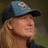 Portrait of an Underexposed community photographer wearing a blue cap